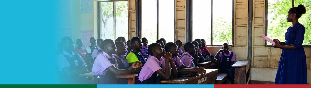 A female teaching primary pupils